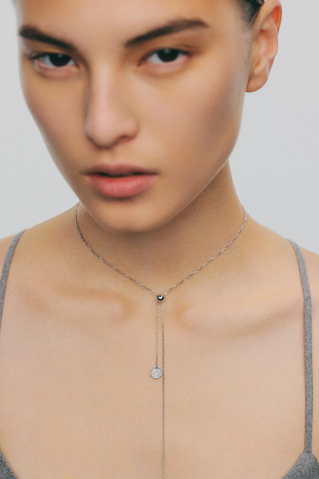 Tie necklace, clubs, white gold