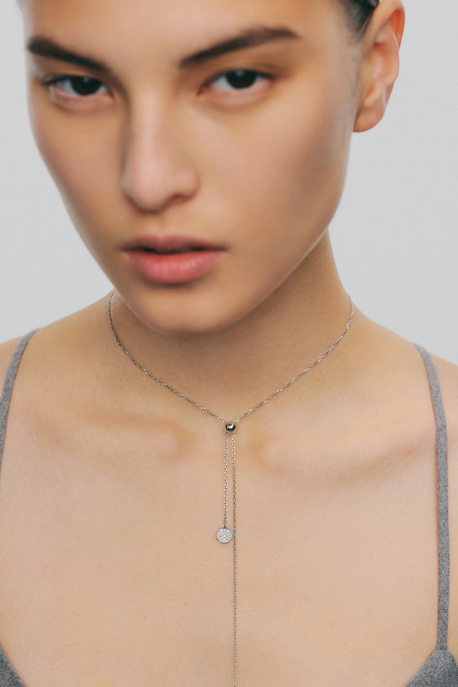 Tie necklace, clubs, white gold