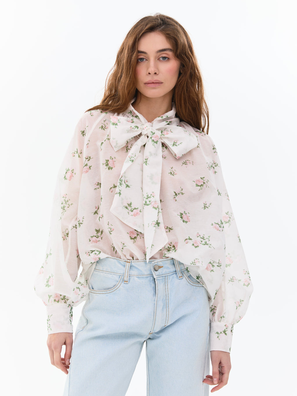 Блуза з бантом в квітковий принт