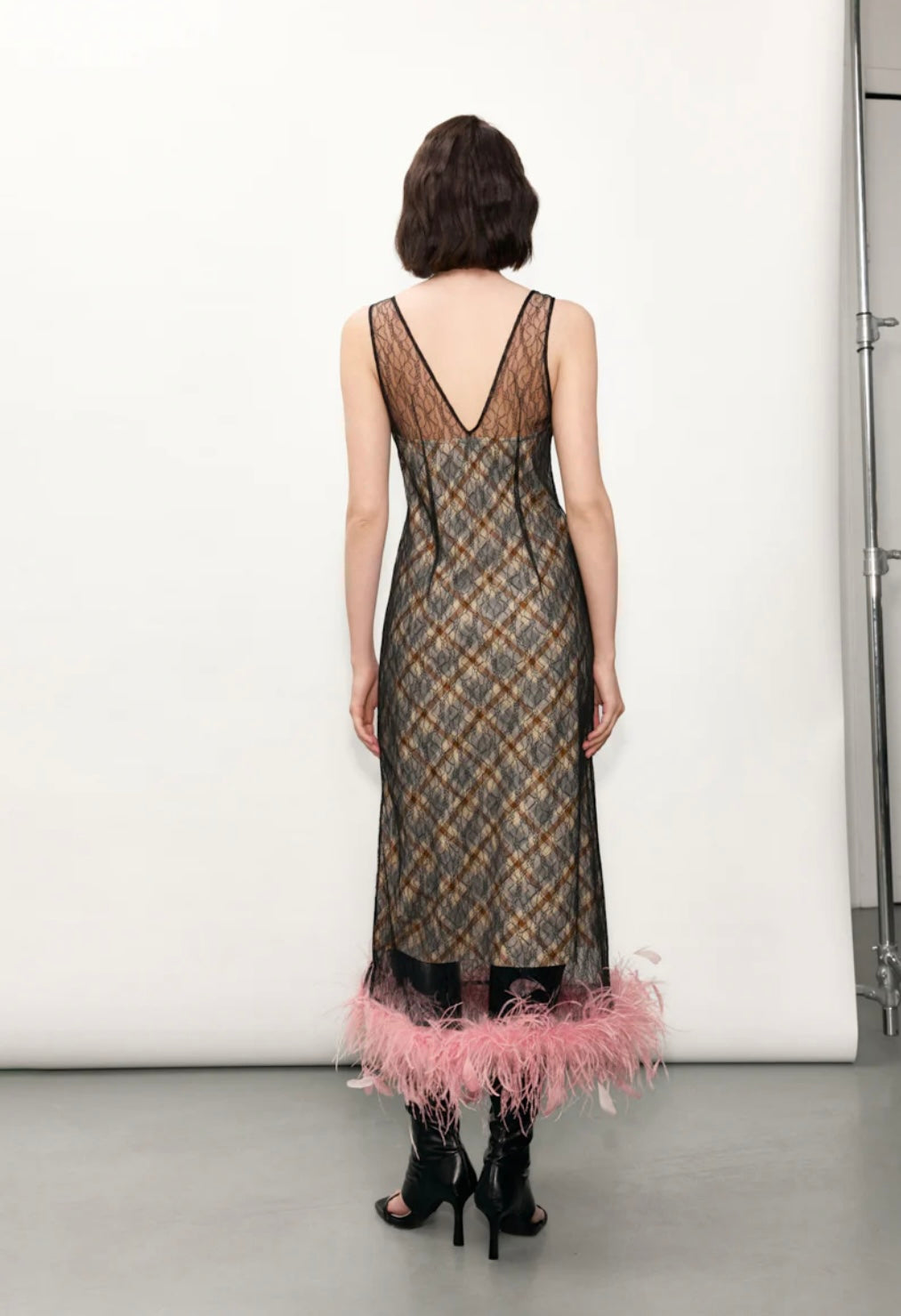 Checked dress with feathers
