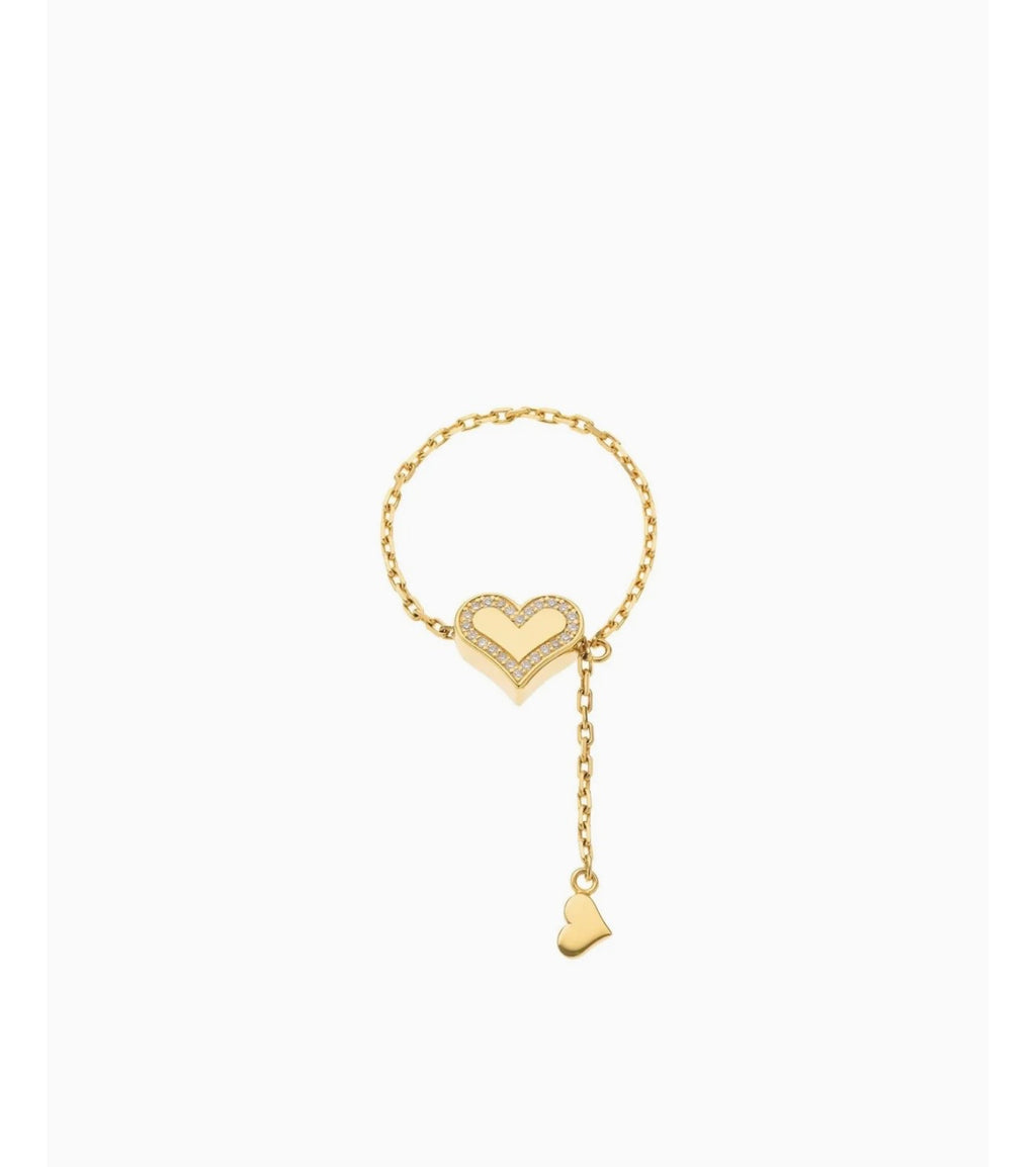Transforming ring, heart on a chain with diamonds along the contour, yellow gold