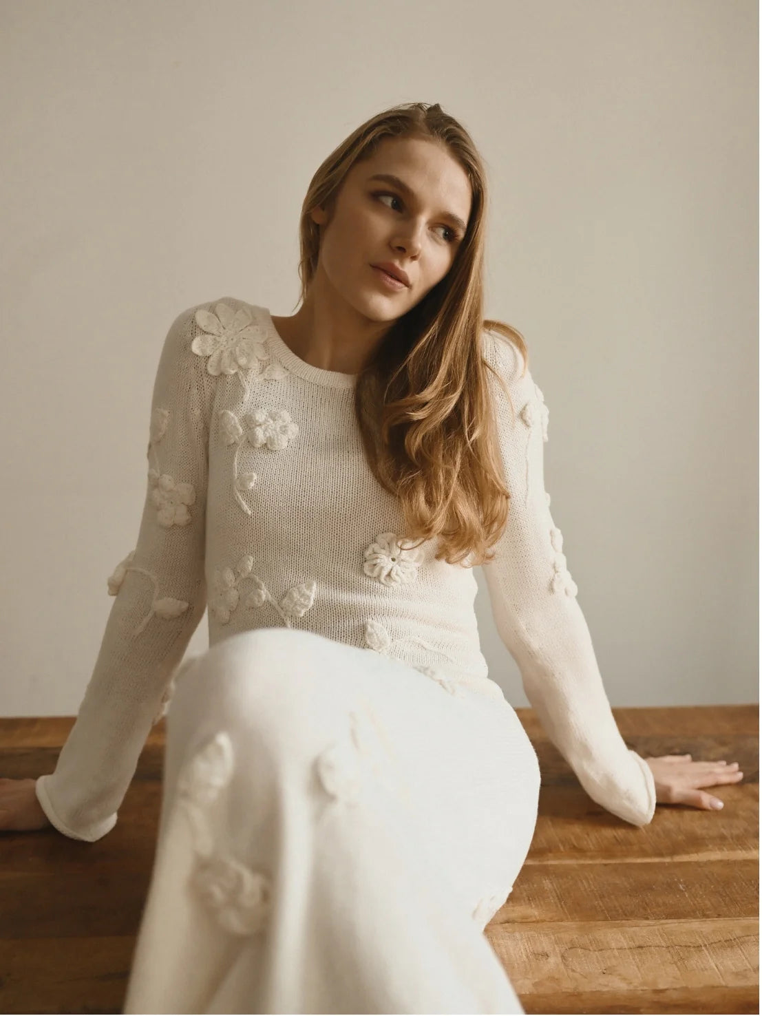 Sensual dress with knitted flowers