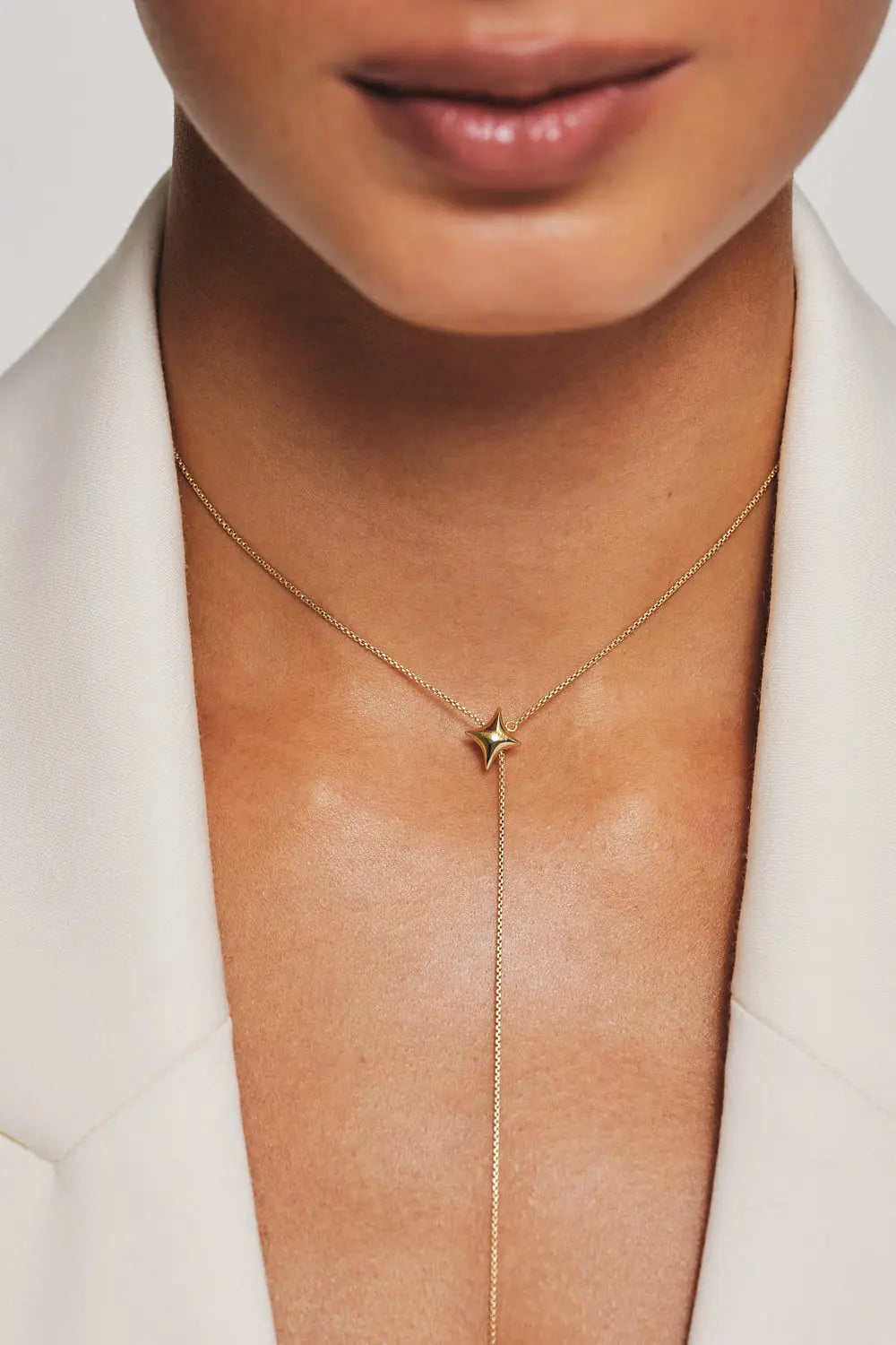 Star-shaped necklace, yellow gold