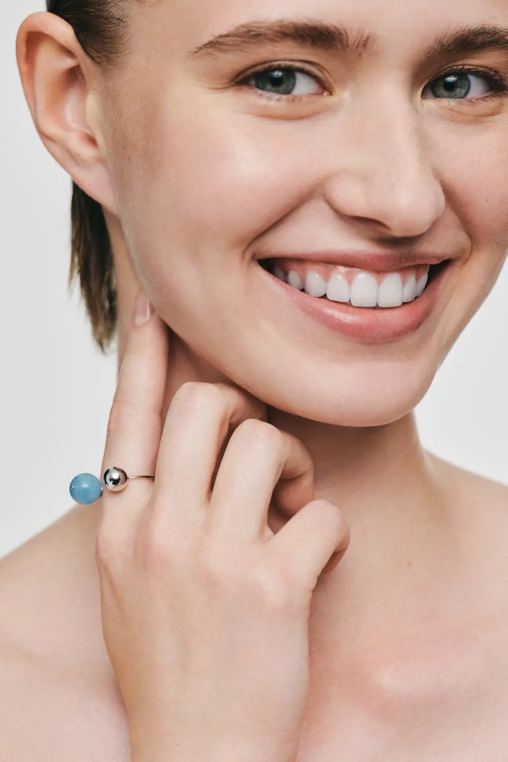Ring with gold and aquamarine balls (8 mm and 10 mm)