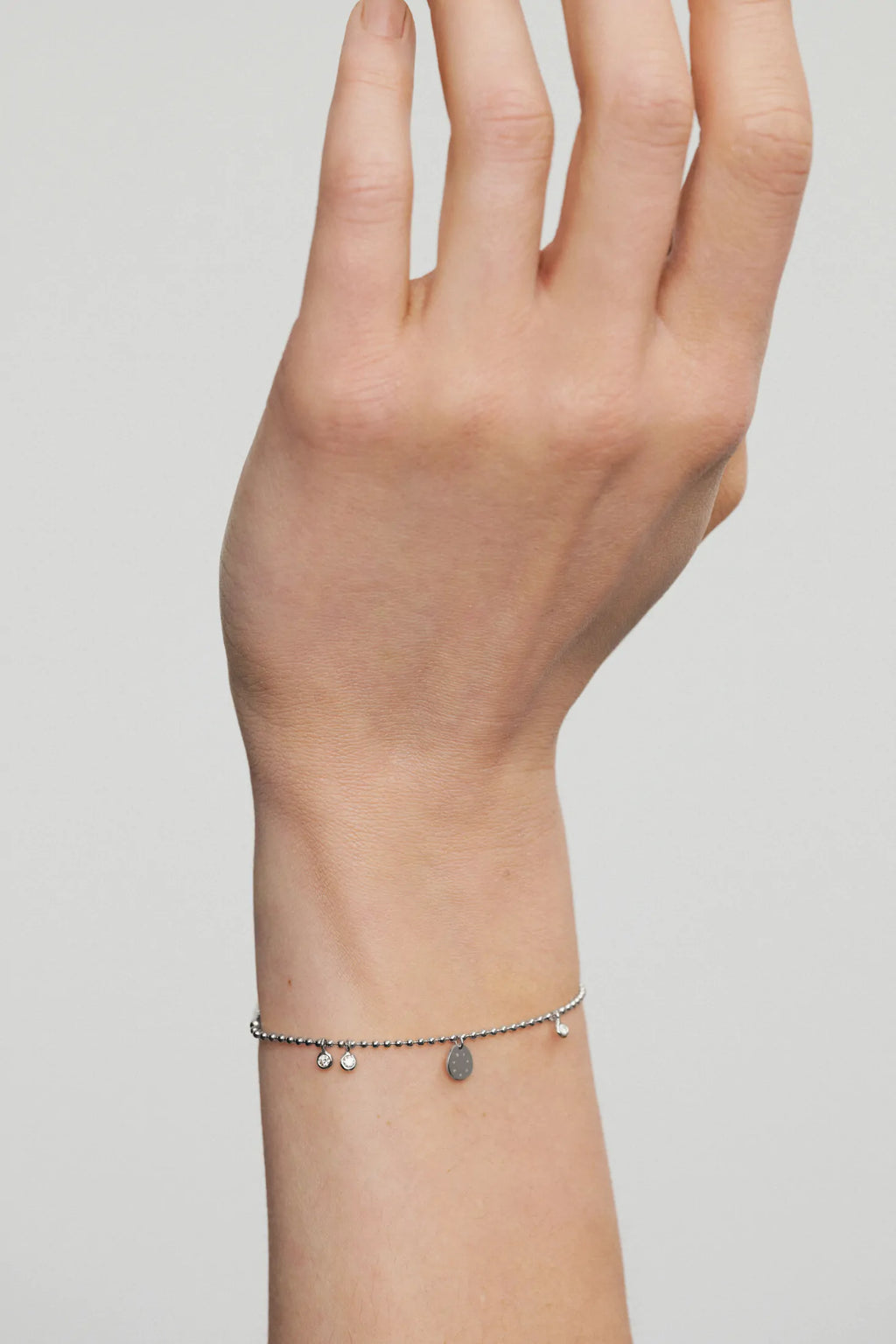 Diamond and club bracelet, white gold